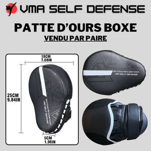 Patte d'ours boxe : incurvée noir et blanche avec forte densité et scratch de fixation. Dimension de 18 cm x 25 cm x 5 cm